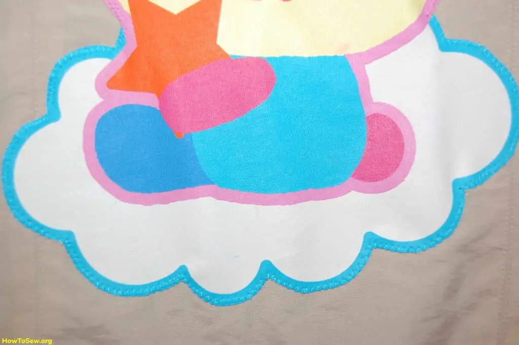 Fabric applique for clothes. Decorate a girl jacket.