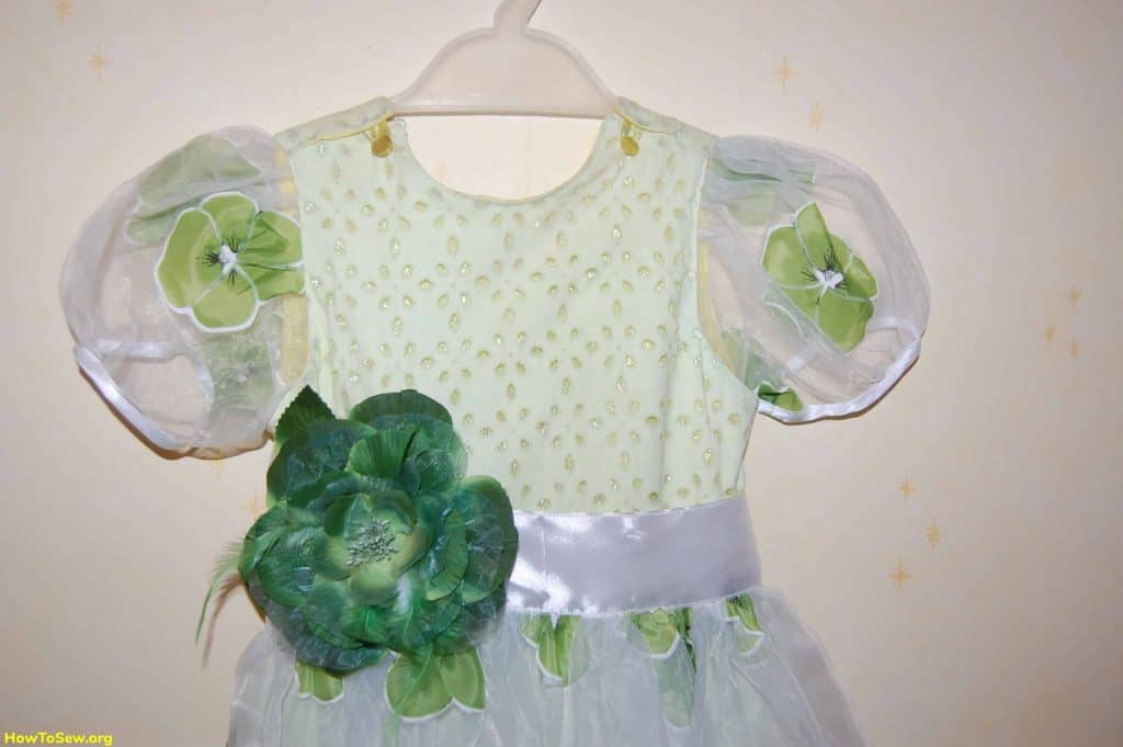 Kids holiday dress with green flowers