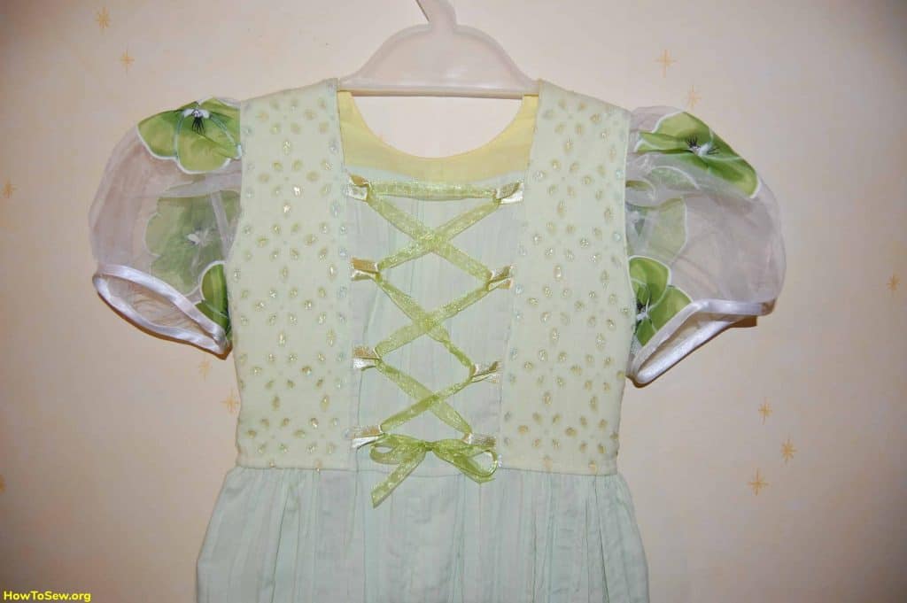 Kids holiday dress with green flowers